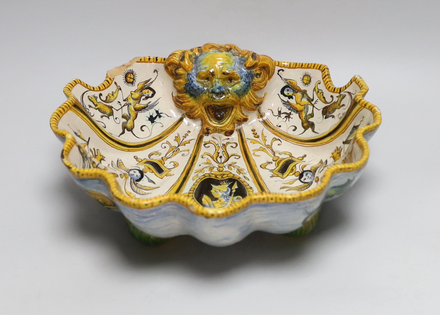 A late 19th/early 20th century Cantagalli maiolica scallop shell shaped dish, painted cockerel mark to base. 29cm long